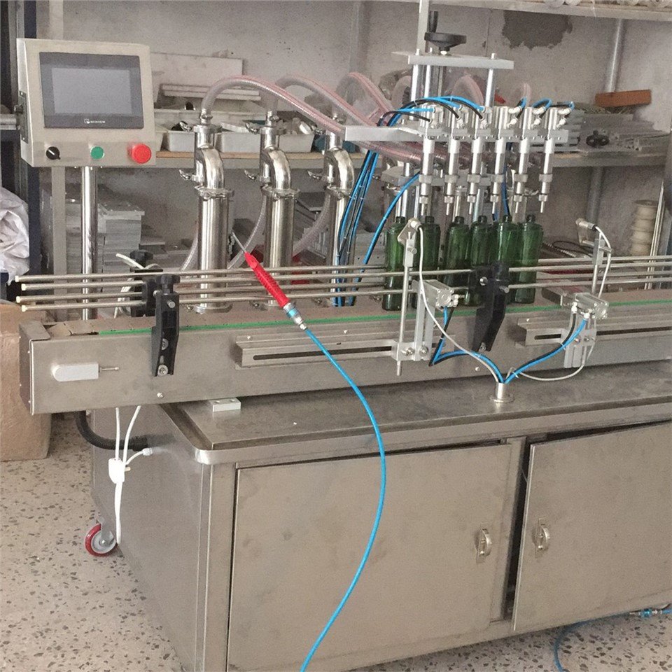 Otomatik 6 tèt ranpli machin